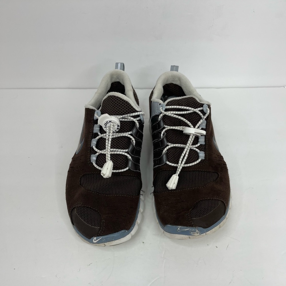 Nike Free 5.0 sneakers. Brown and white. Size 8.5